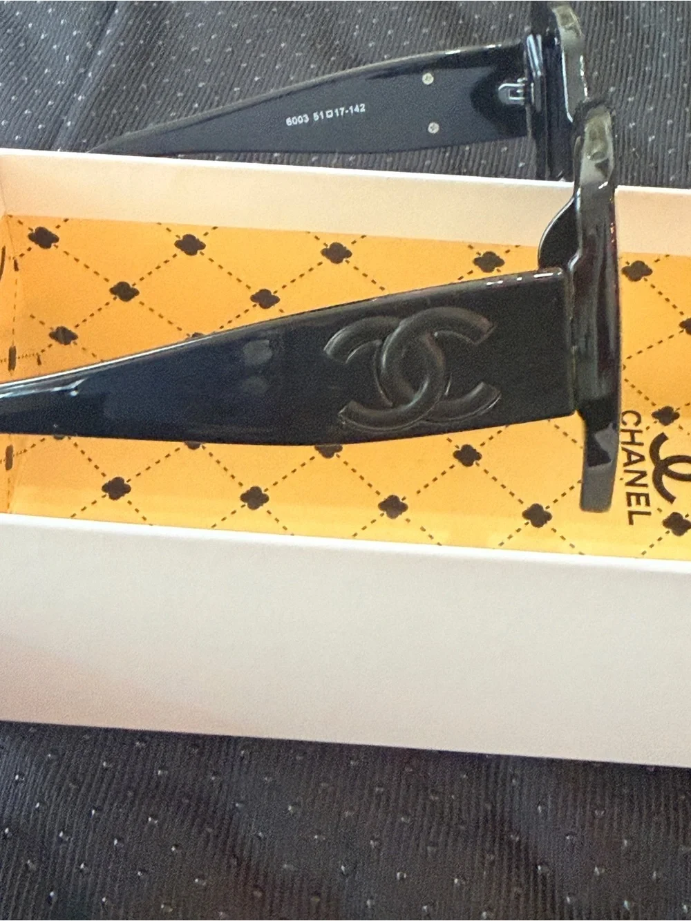 CHANEL Black-on-Black Interlocking CC Sunglasses New in Original packaging.